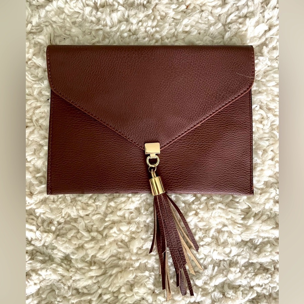 Big Buddha envelope tassel Clutch